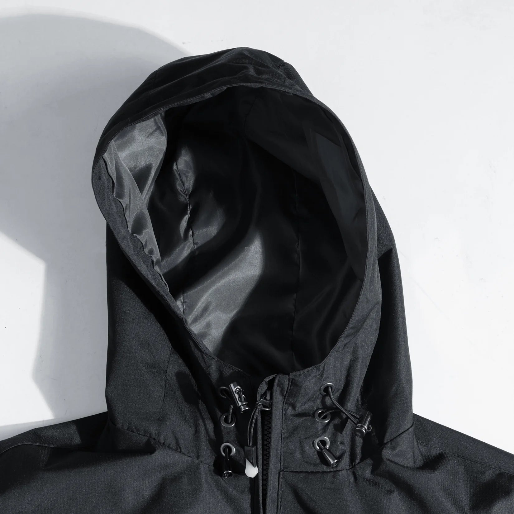 Black 4X-Large Lightweight Water Resistant Hooded Rain Jacket A58592